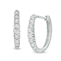 Previously Owned - 1/2 CT. T.w. Diamond Oval Hoop Earrings in 10K White Gold