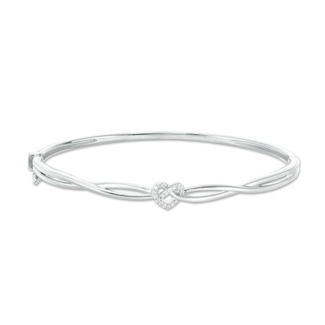 Previously Owned - 1/10 CT. T.w. Diamond Heart Knot Bangle in Sterling Silver