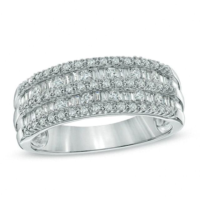 Previously Owned - 1/2 CT. T.w. Baguette and Round Diamond Anniversary Band in 10K White Gold