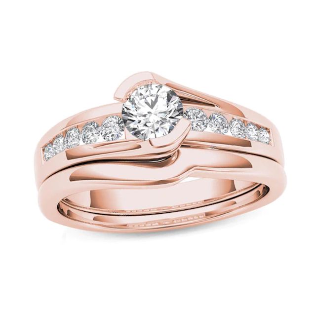 Previously Owned - 1/2 CT. T.w. Diamond Bypass Bridal Set in 14K Rose Gold