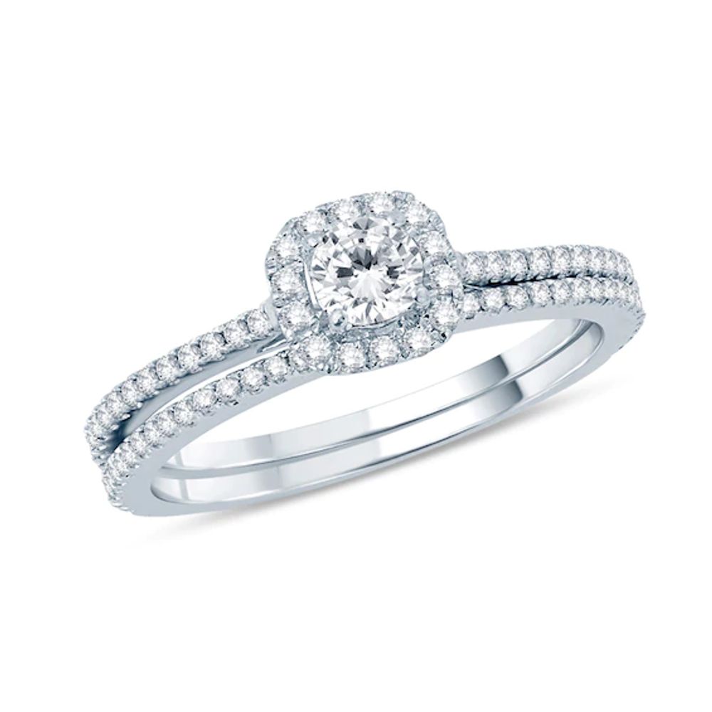 Previously Owned - 5/8 CT. T.w. Diamond Frame Bridal Set in 14K White Gold