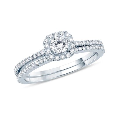 Previously Owned - 5/8 CT. T.w. Diamond Frame Bridal Set in 14K White Gold