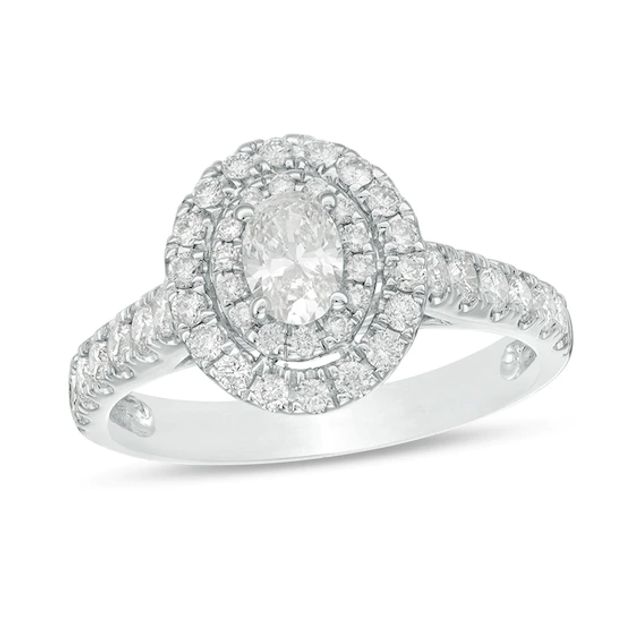 Previously Owned - 1 CT. T.w. Oval Diamond Double Frame Engagement Ring in 14K White Gold