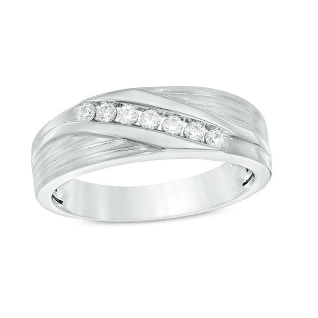 Previously Owned - Men's 1/4 CT. T.w. Diamond Seven Stone Slant Wedding Band in 10K White Gold