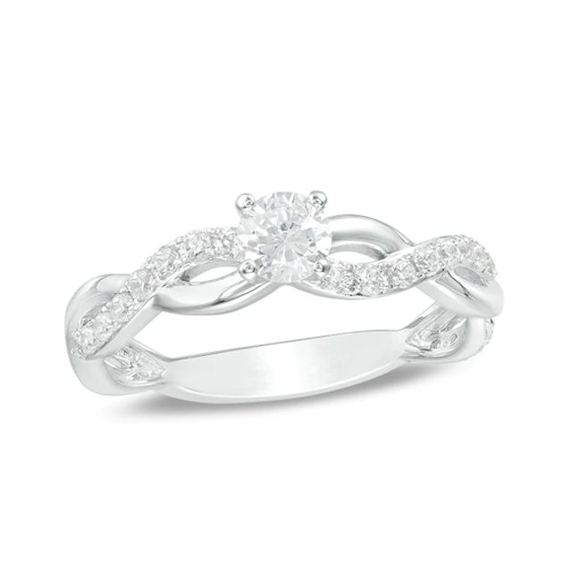 Previously Owned - 1 CT. T.w. Diamond Twist Engagement Ring in 14K White Gold