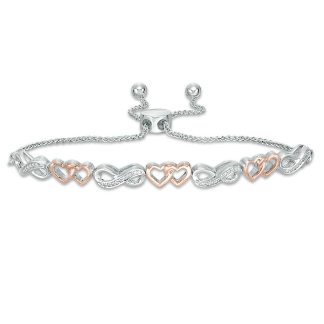 Previously Owned - 1/20 CT. T.w. Diamond Heart Infinity Bolo Bracelet in Sterling Silver and 10K Rose Gold - 9.5"