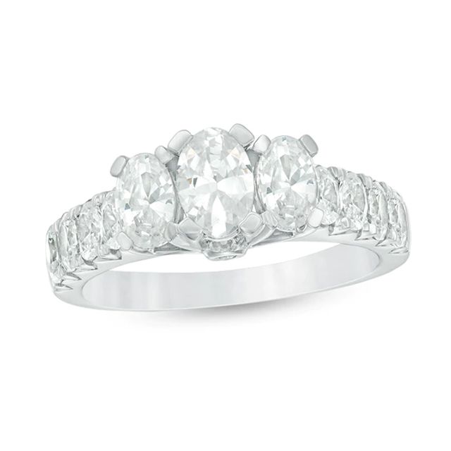 Previously Owned - 2 CT. T.w. Oval Diamond Past Present FutureÂ® Engagement Ring in 14K White Gold (I/I1)