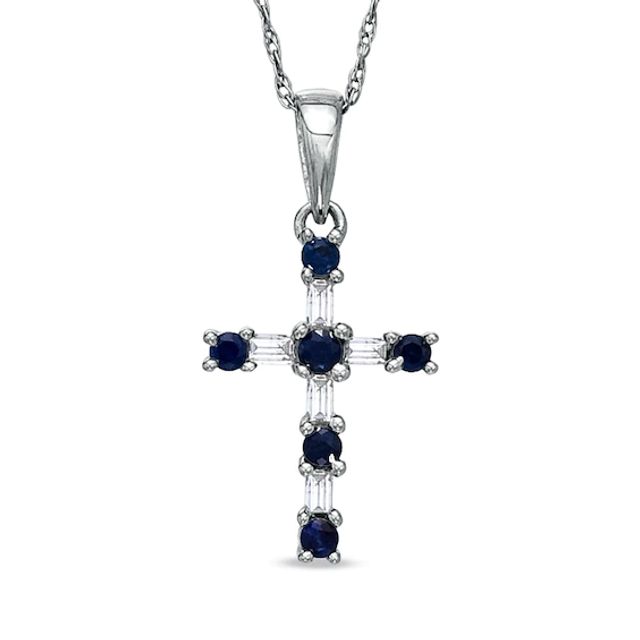 Previously Owned - Blue Sapphire and 1/10 CT. T.w. Baguette Diamond Cross Pendant in 10K White Gold