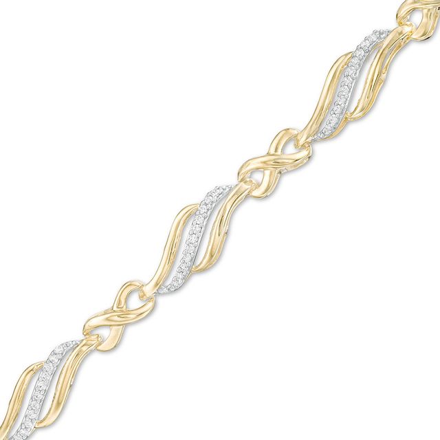 Previously Owned - 1/4 CT. T.w. Diamond Alternating Infinity Bracelet in 10K Gold â 7.5"