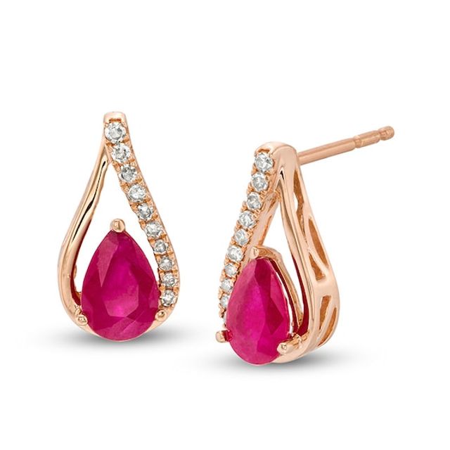 Previously Owned - Pear-Shaped Ruby and 1/15 CT. T.w. Diamond Teardrop Earrings in 10K Rose Gold