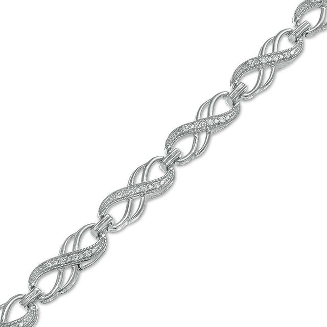 Previously Owned - 1/4 CT. T.w. Diamond Double Infinity Loop Bracelet in Sterling Silver â 7.25"