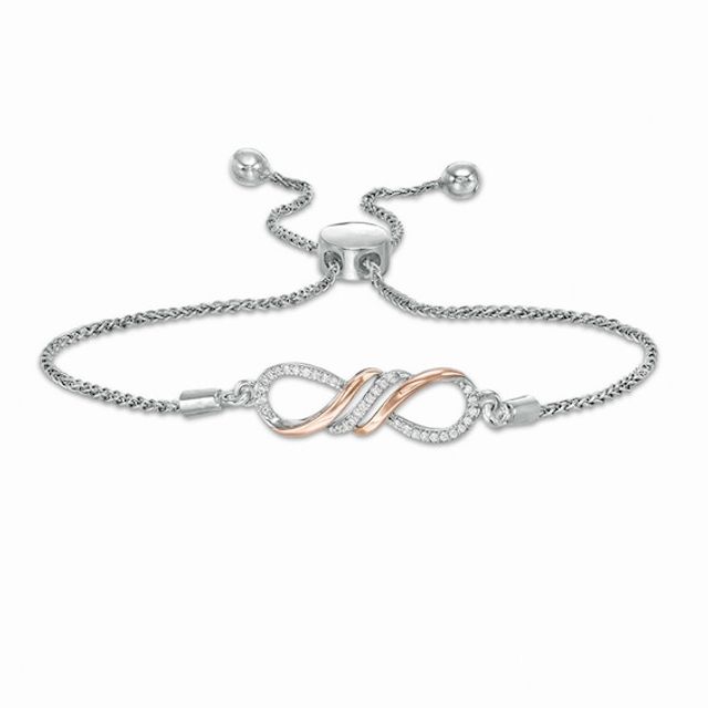 Previously Owned - 1/15 CT. T.w. Diamond Sideways Infinity Bolo Bracelet in Sterling Silver and 10K Rose Gold - 9.5"