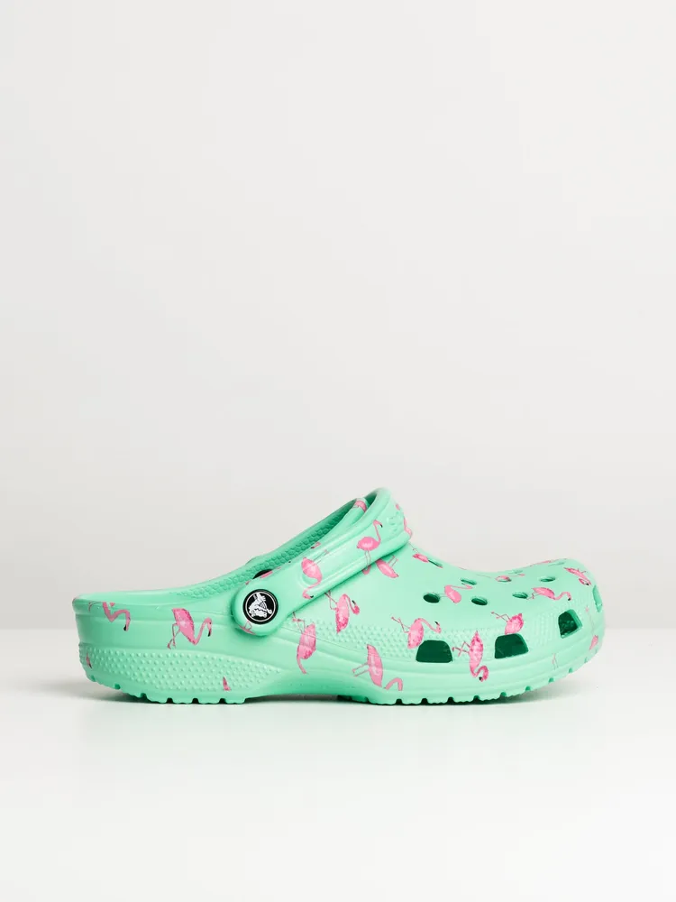 Blue crocs sales with flamingos