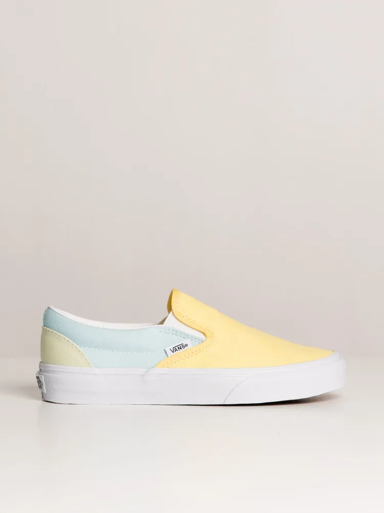 Pastel yellow store vans slip on