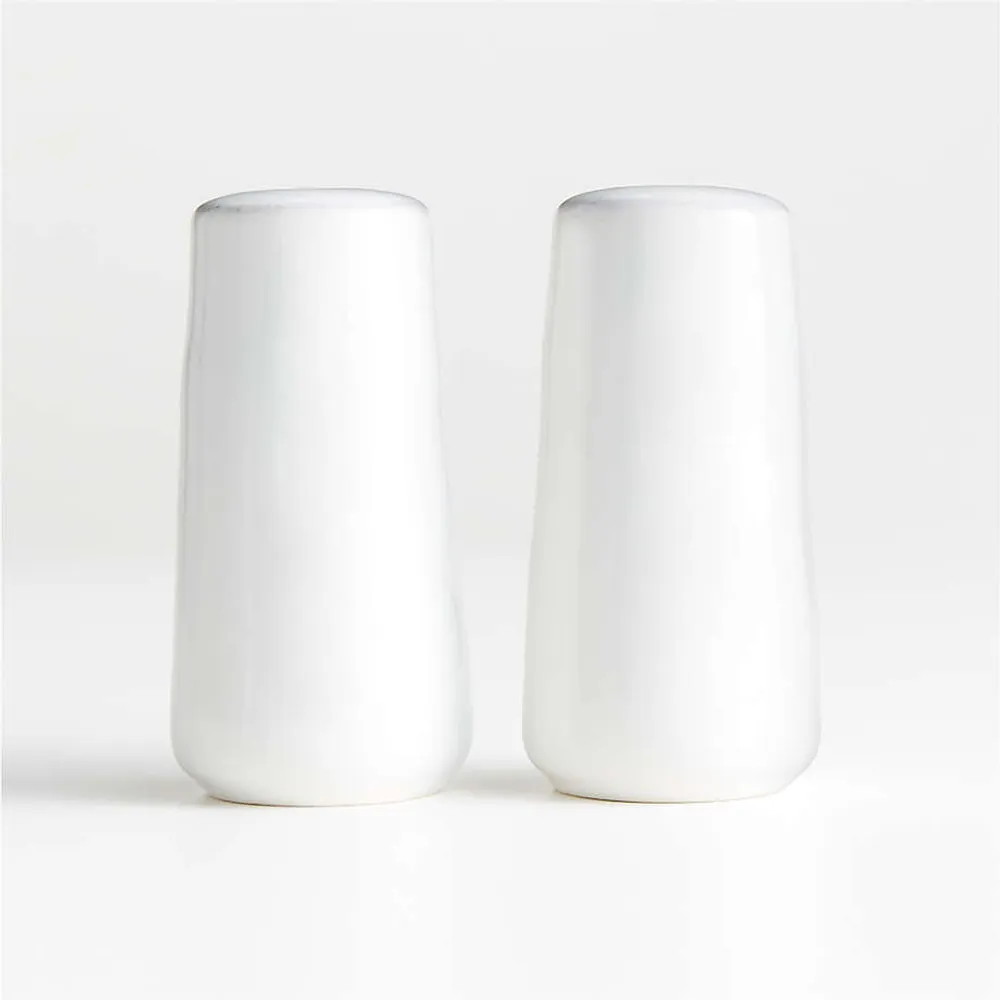 Large white salt sales and pepper shakers