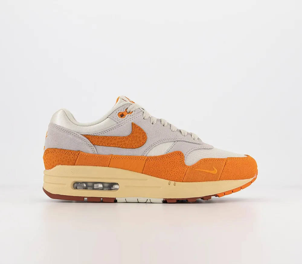 Nike grey 2024 orange trainers