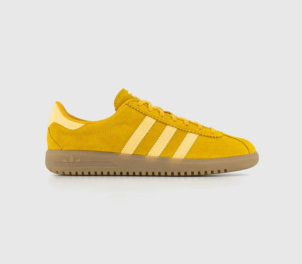 Yellow adidas outlet trainers