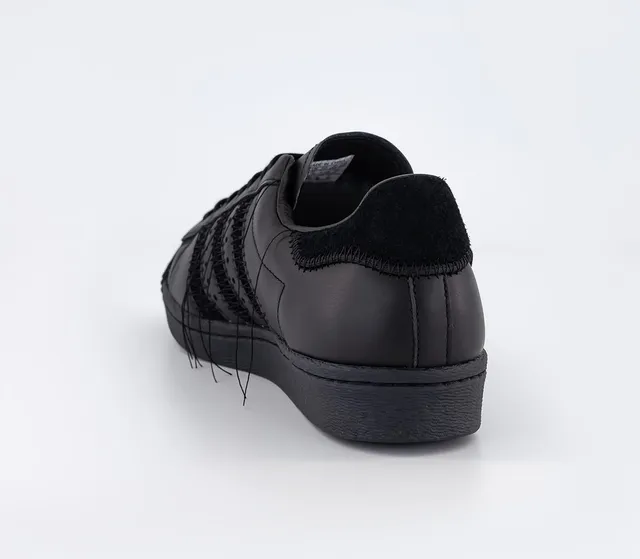 Adidas black e outlet amp; pink superstar trainers