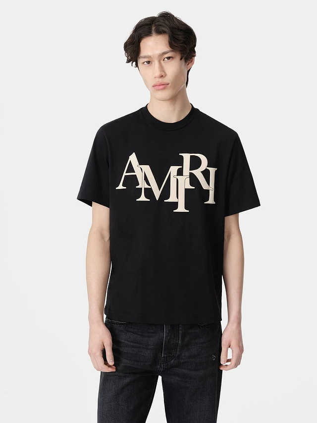 Shop AMIRI STAGGERED TEE - Black at Beverly Center in Los