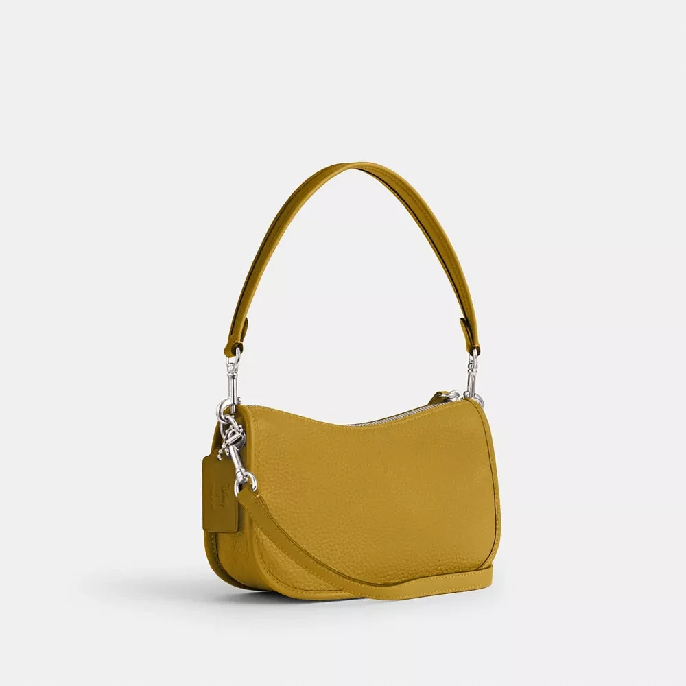 Coach Disney X Coach Swinger Bag In Regenerative Leather