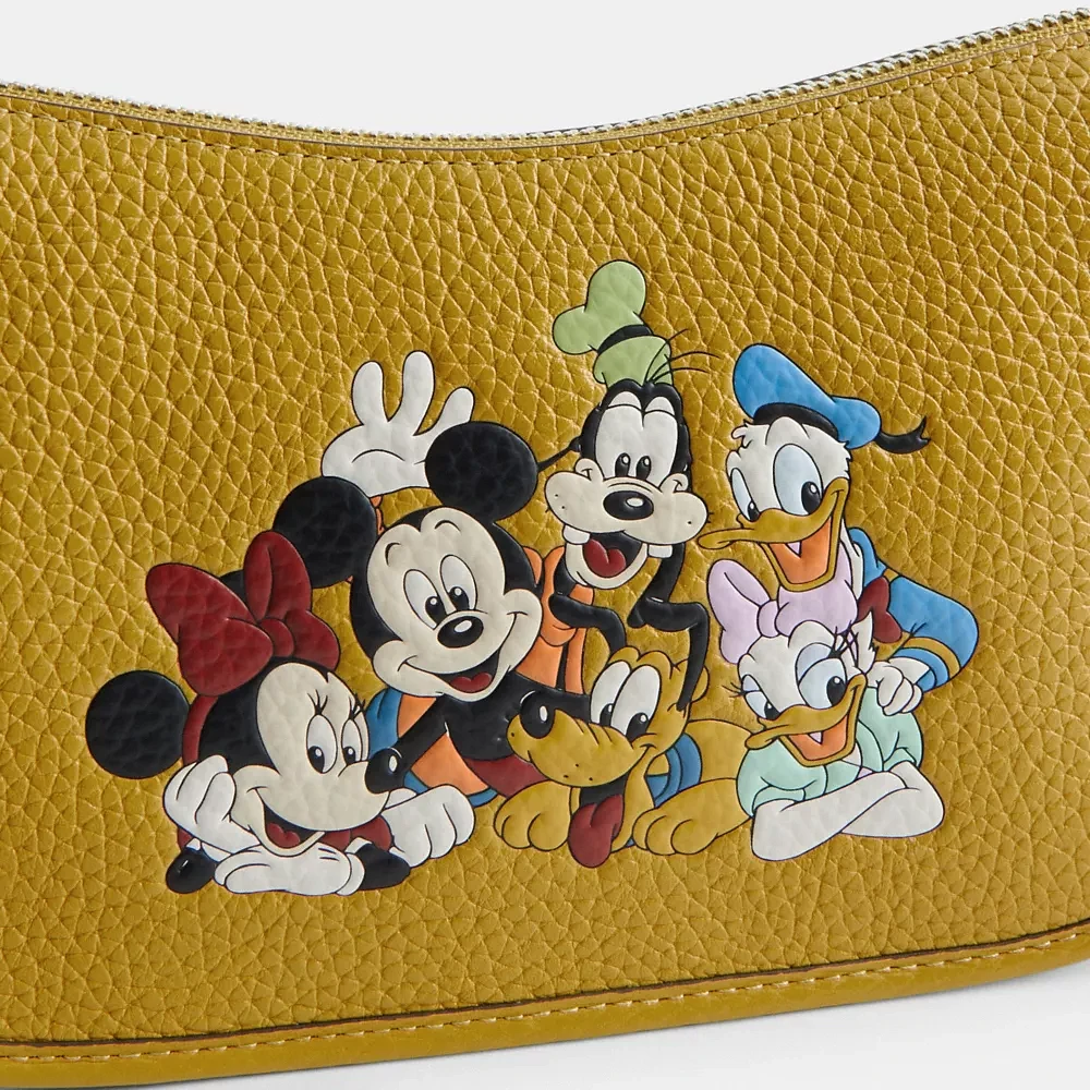 Coach Disney X Coach Swinger Bag In Regenerative Leather