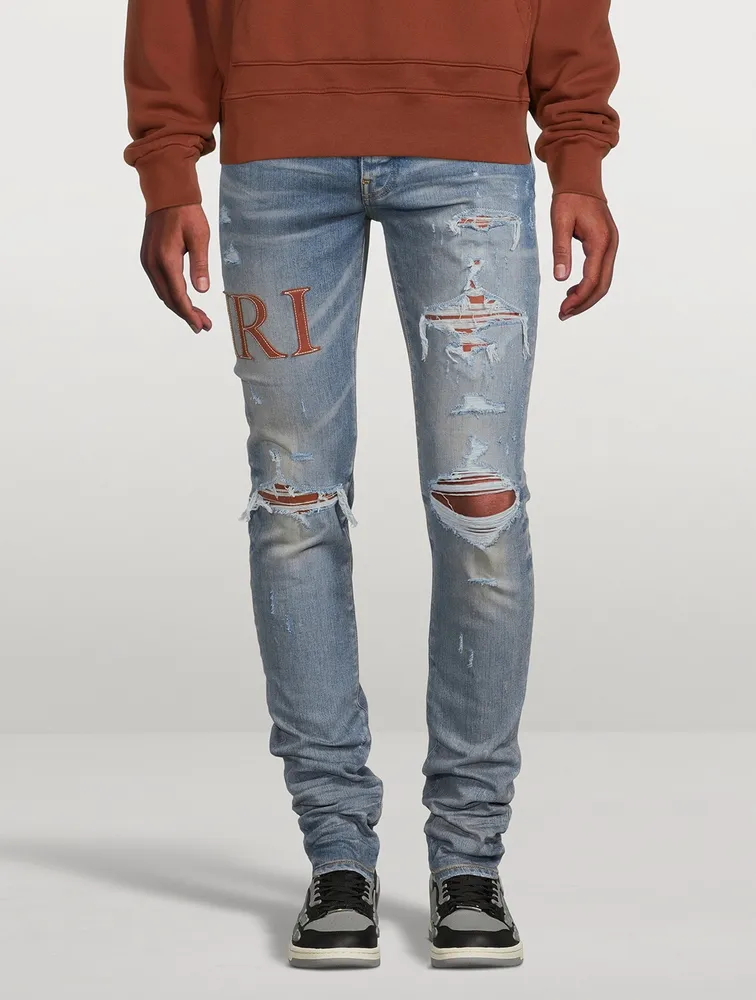 Amiri best sale jeans leather