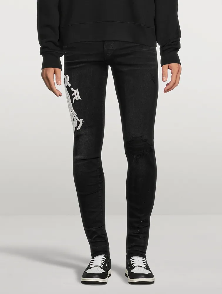 AMIRI Wes Lang Skinny Jeans With Reaper Logo | Square One