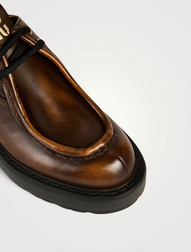 MiuMiu Leather Lug-Sole Wallabies ラグソール ワラビー ロゴ MIU MIU Leather Lug-Sole Wallabies | Yorkdale Mall