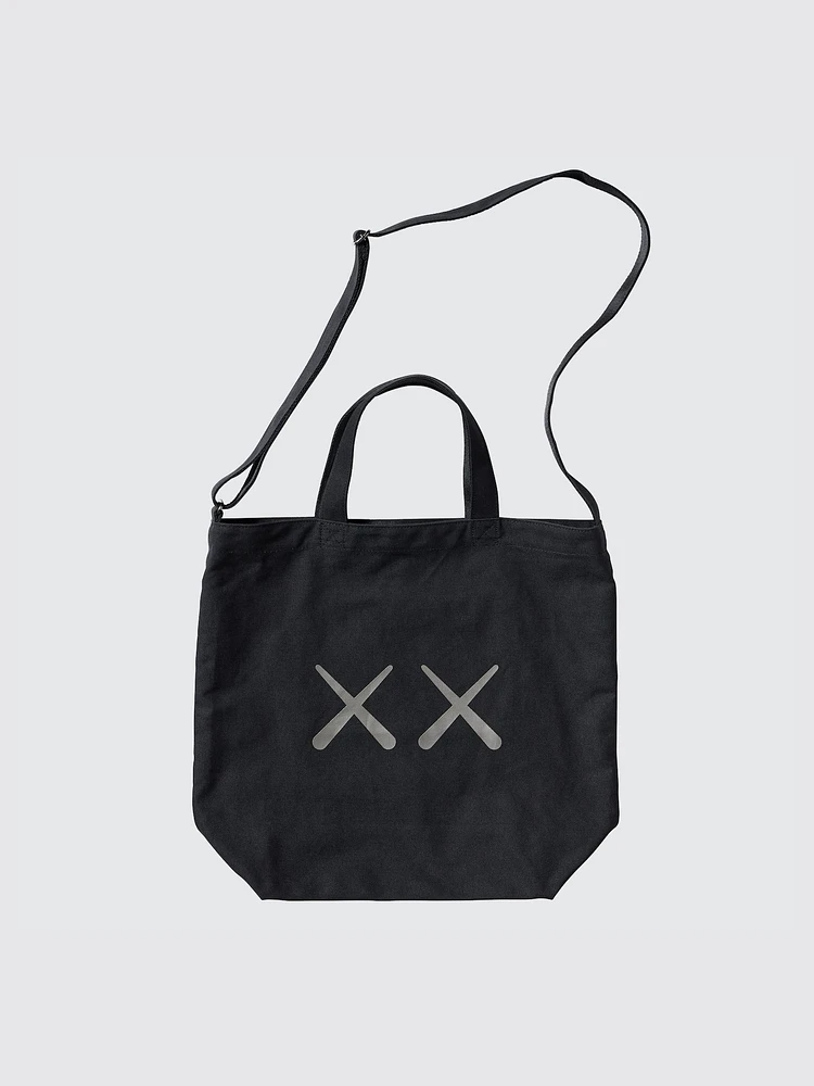 KAWS x Uniqlo tote bag with original outlet paper bag