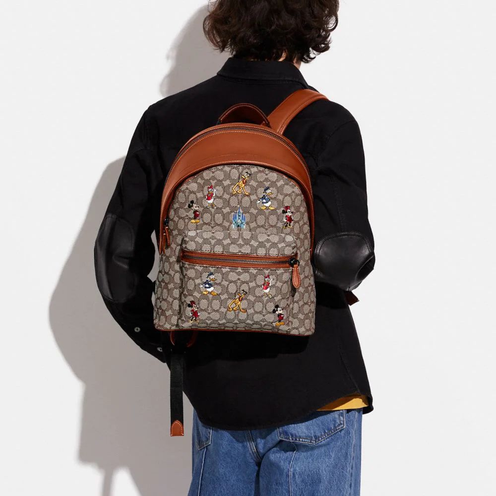 COACH® Disney X Coach Charter Backpack In Signature Textile Jacquard ...