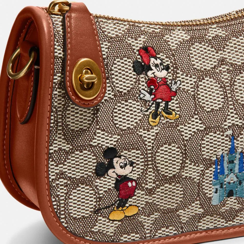 COACH® Disney X Coach Swinger Bag In Signature Textile Jacquard