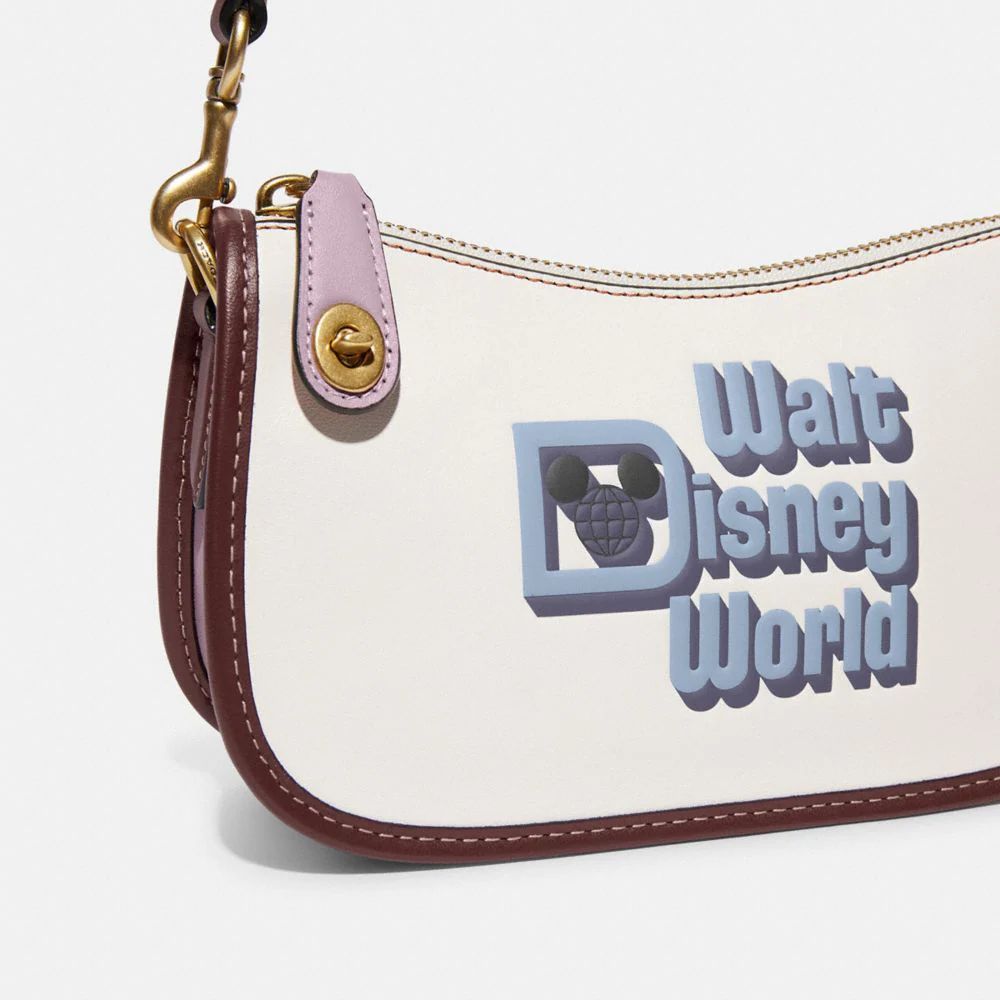 Coach Walt hot Disney World swinger bag