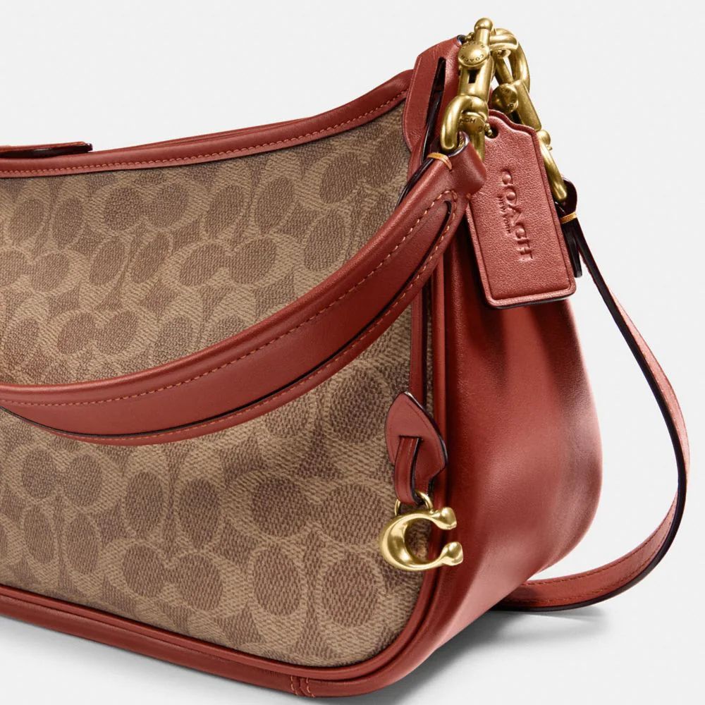 Coach sutton discount signature canvas crossbody