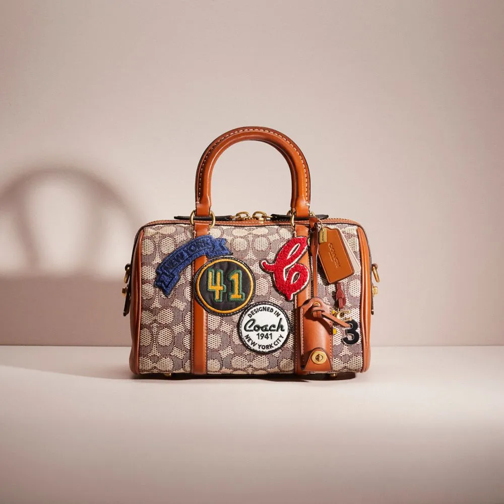 Coach mini prince selling jacquard satchel