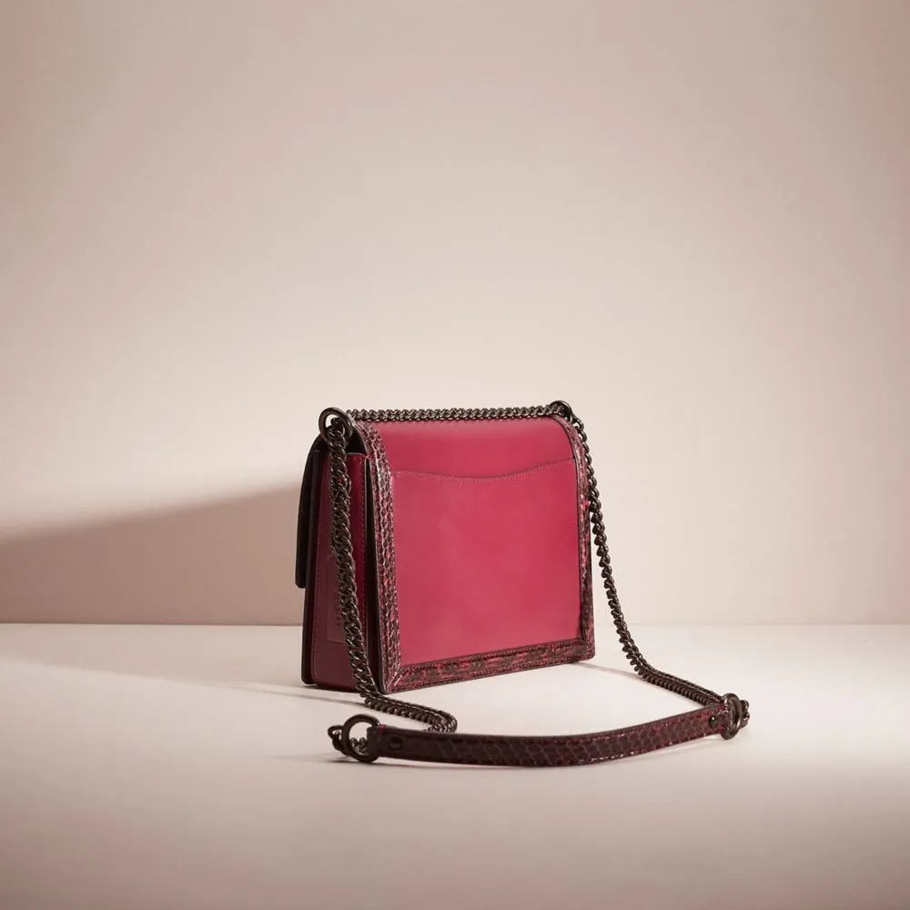 Hutton shoulder bag online in snakeskin