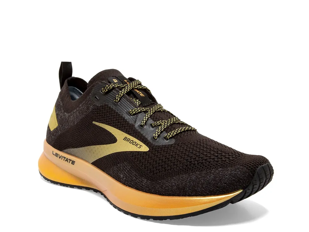 Brooks black store and gold shoes