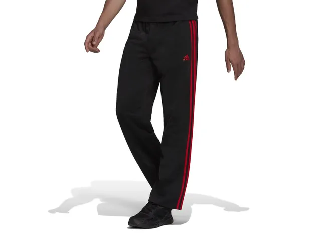 Adidas pants black sales with red stripes