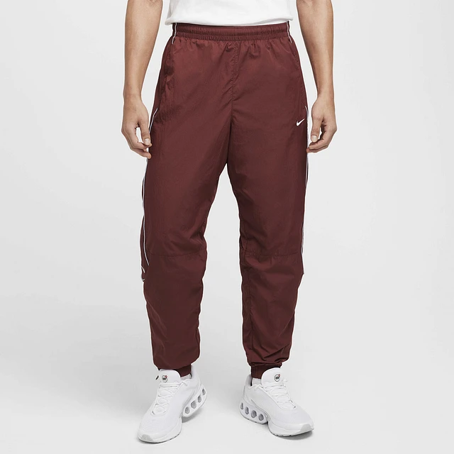 Nike taped woven pant on sale