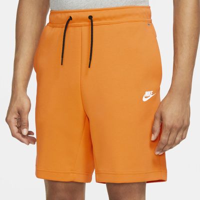 yellow nike fleece shorts