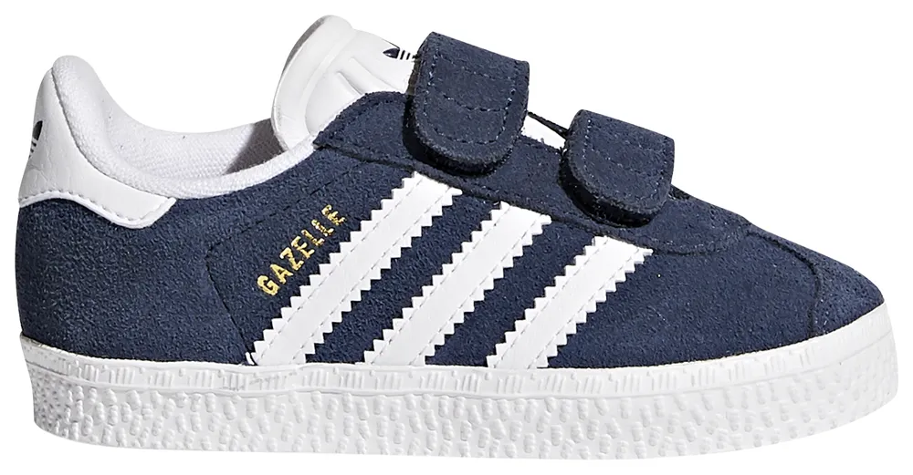 Toddler boy hotsell white adidas shoes