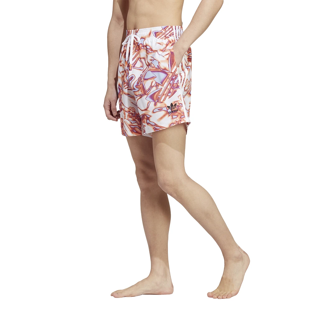 Adidas originals shorts with all over print in pink hotsell