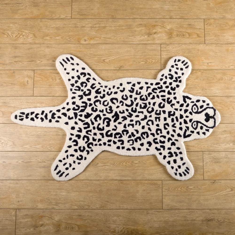 Kirklands Snow Leopard Shaped Scatter Rug | Hamilton Place