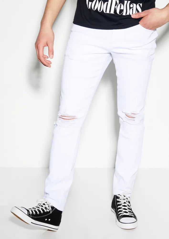 White skinny store jeans ripped knee