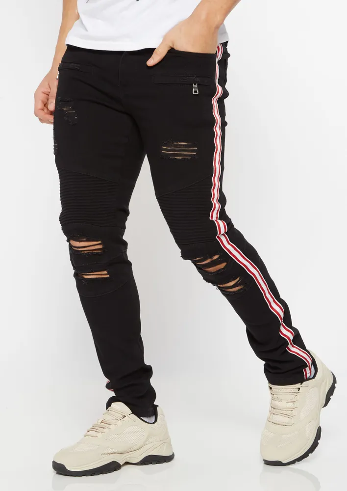 Black ripped jeans outlet with white stripe