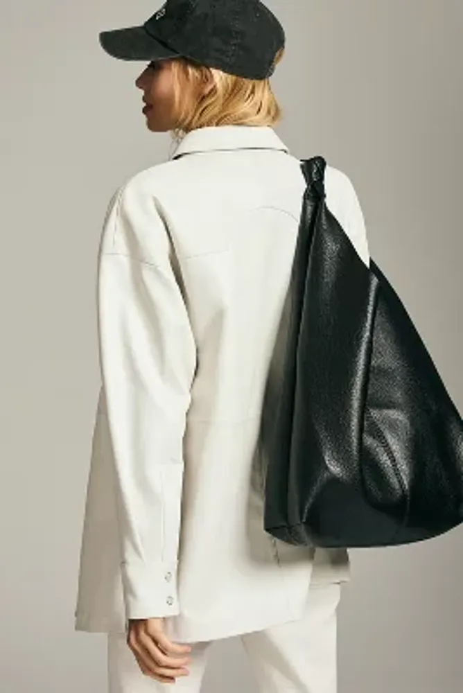 By Anthropologie The Love Knot Faux Leather Bag | Bridge Street