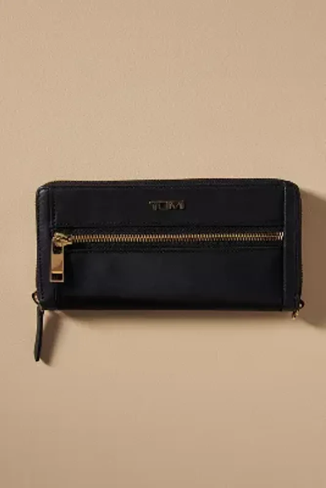 Tumi zip 2024 around continental wallet