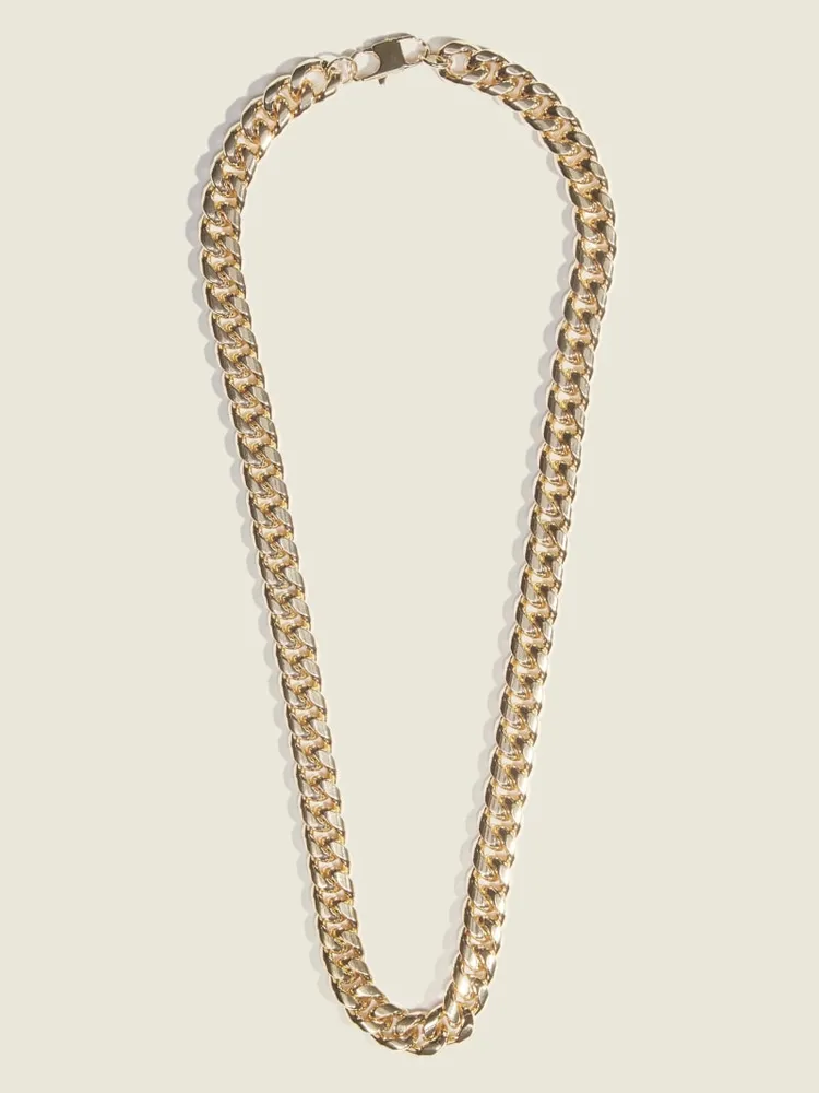 Guess gold tone necklace top