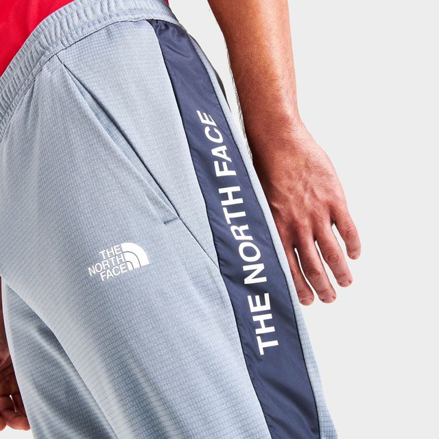 The north face train discount n logo track pants grey