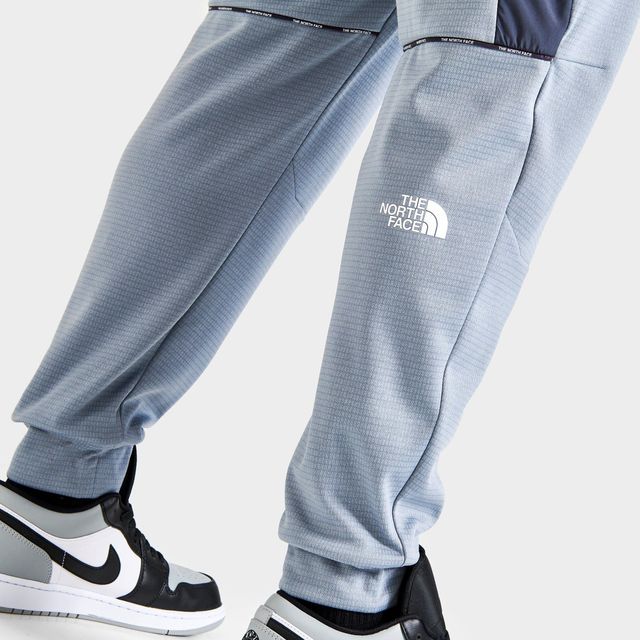 The north face discount mittelegi woven track pants