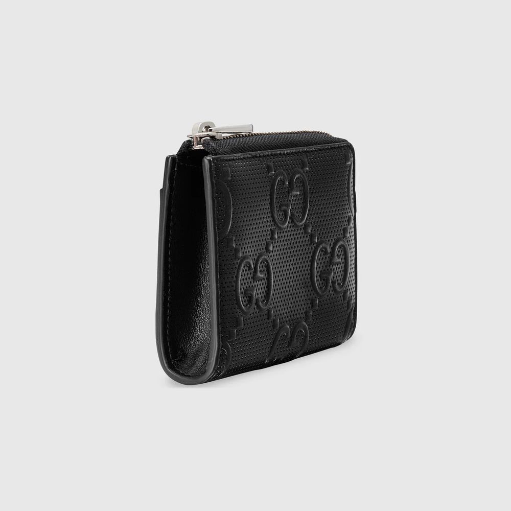 Gucci hotsell embossed purse